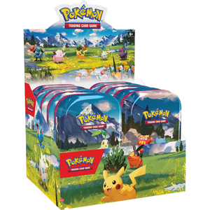Pokémon trading card game packaging with Pikachu and other characters on a grassy field background.