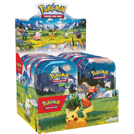 Pokémon trading card game packaging with Pikachu and other characters on a grassy field background.